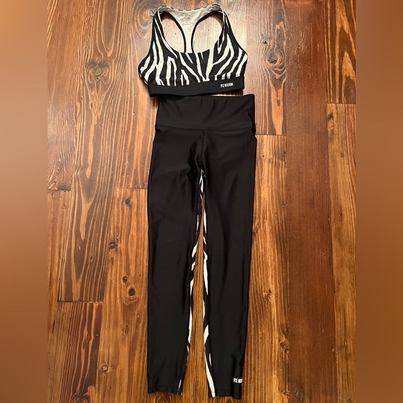 P.E. NATION Rematch Zebra Sports Bra and Workout Leggings SET REVOLVE Yoga - Picture 6 of 10